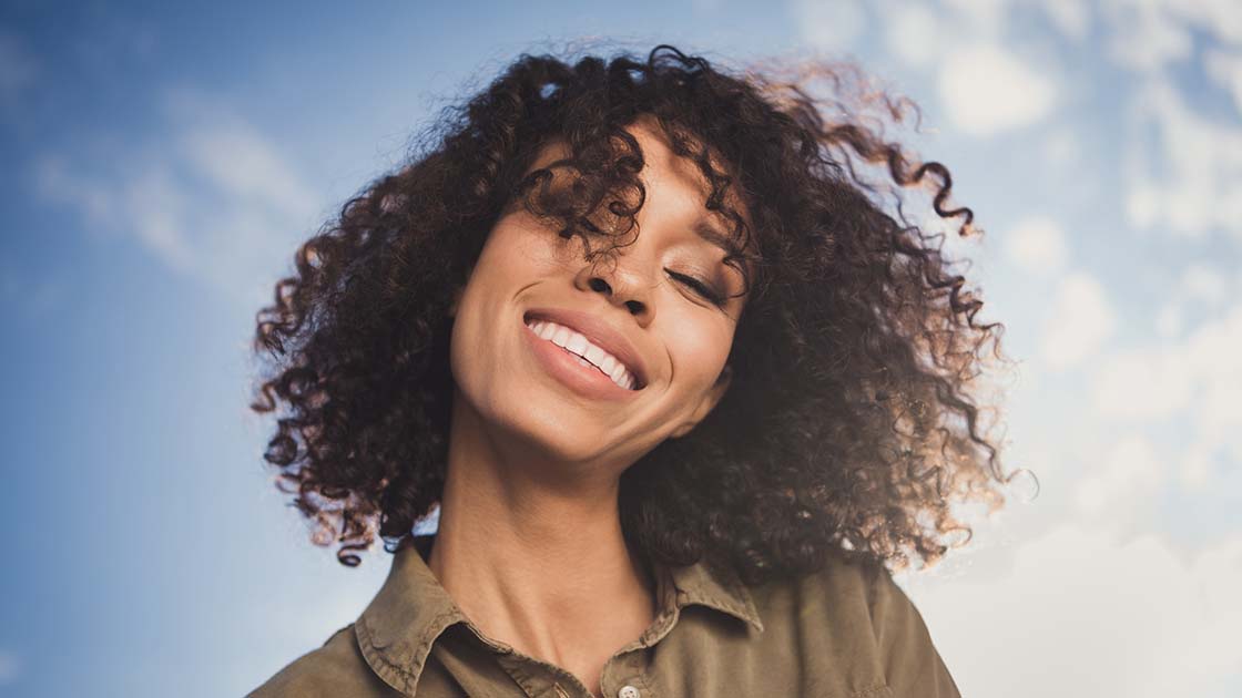 Lady with sky in background